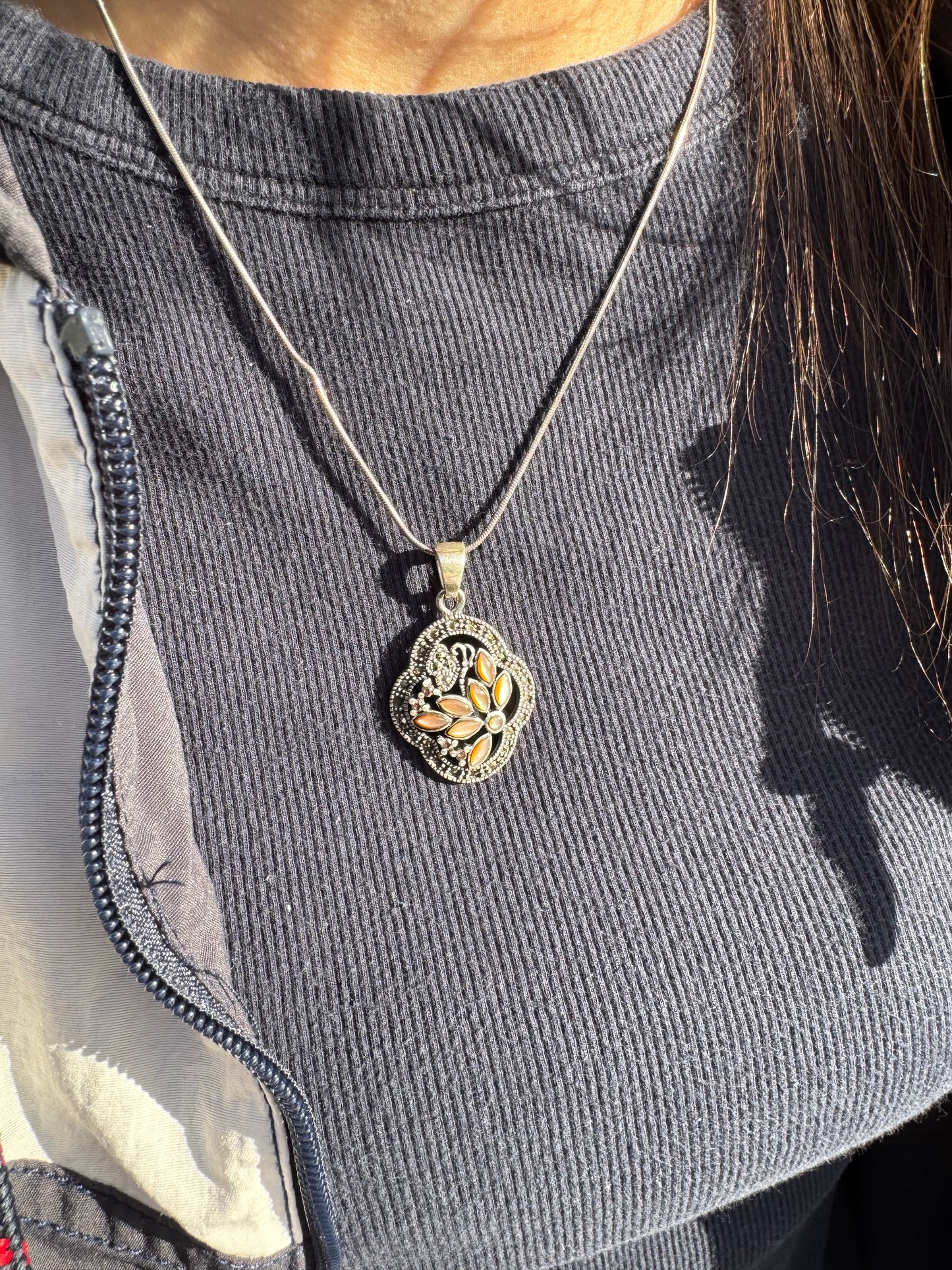 THE BROWN MOTHER OF PEARL FLOWER WITH MARCASAITE NECKLACE