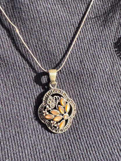 THE BROWN MOTHER OF PEARL FLOWER WITH MARCASAITE NECKLACE
