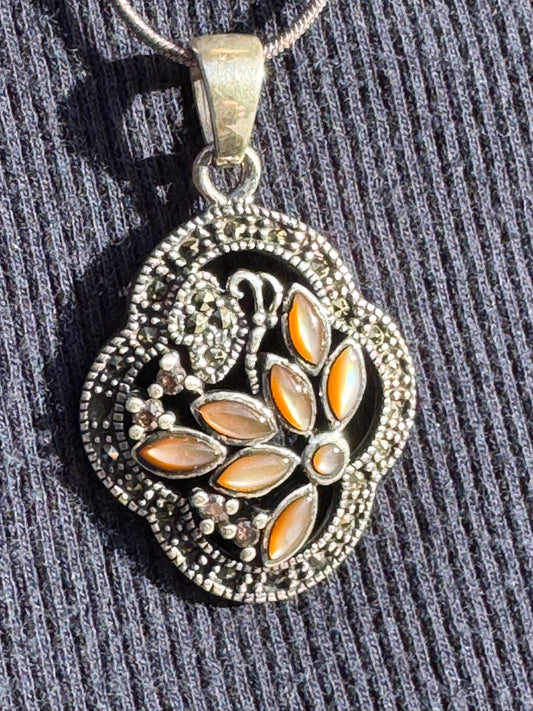THE BROWN MOTHER OF PEARL FLOWER WITH MARCASAITE NECKLACE